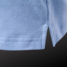 Camisa Polo Masculina Luzzano LN201 com gola refinada, detalhes bordados no peito e tecido leve. Estilo e conforto para eventos casuais e formais.